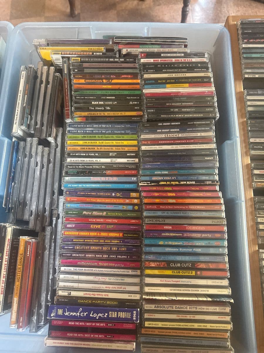 Jewelry CDs tapes, DVDs, VHS galore, lots of clothing, vintage photo 5