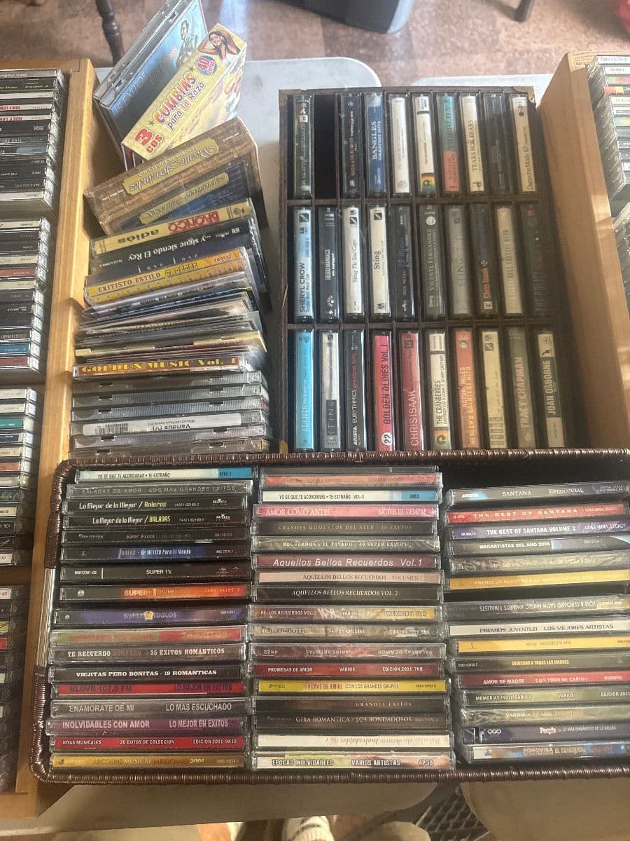 Jewelry CDs tapes, DVDs, VHS galore, lots of clothing, vintage photo 7