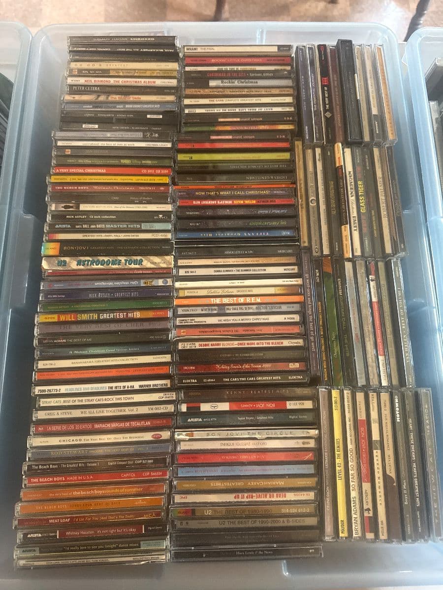 Jewelry CDs tapes, DVDs, VHS galore, lots of clothing, vintage photo 4