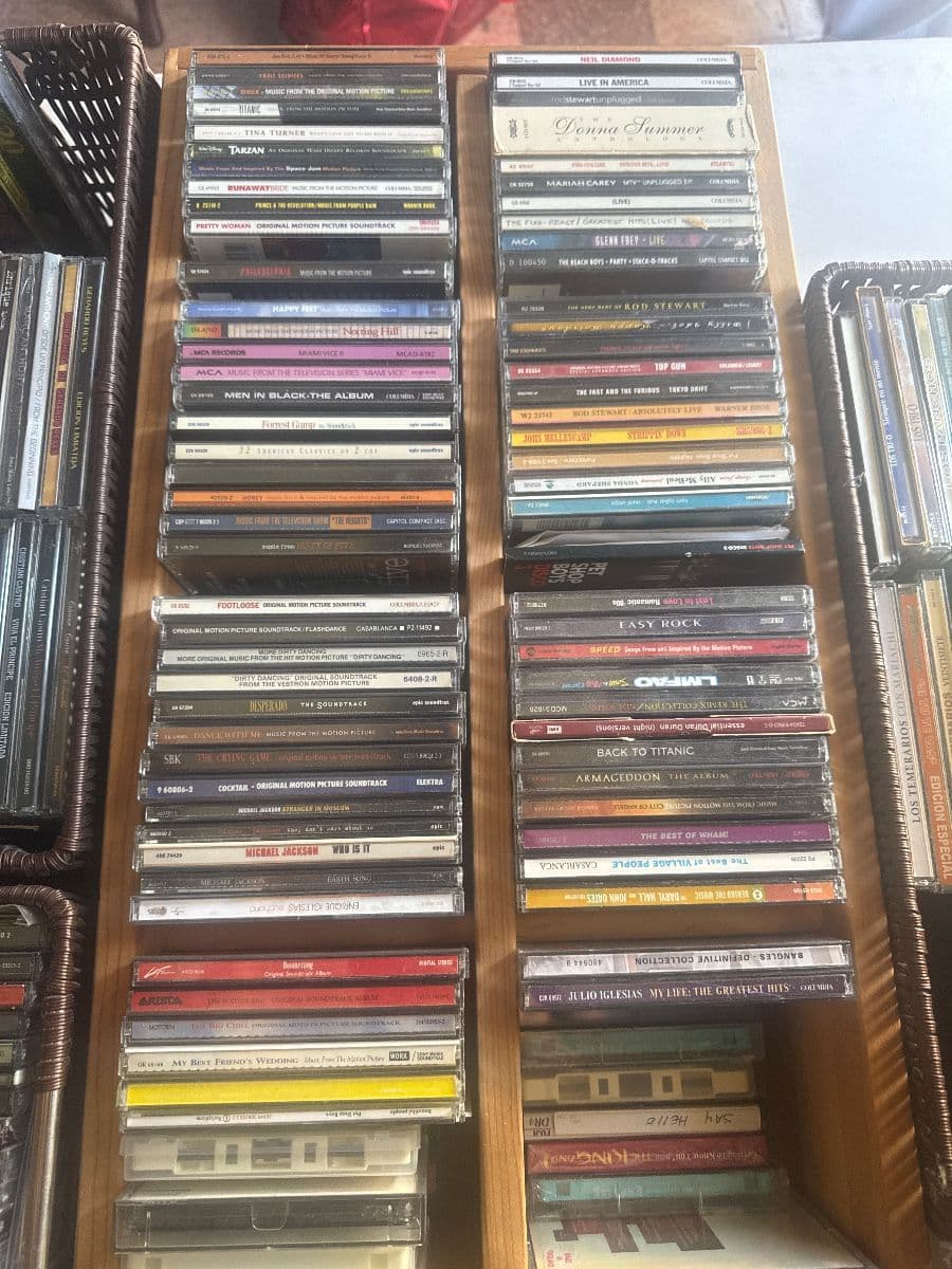 Jewelry CDs tapes, DVDs, VHS galore, lots of clothing, vintage photo 10