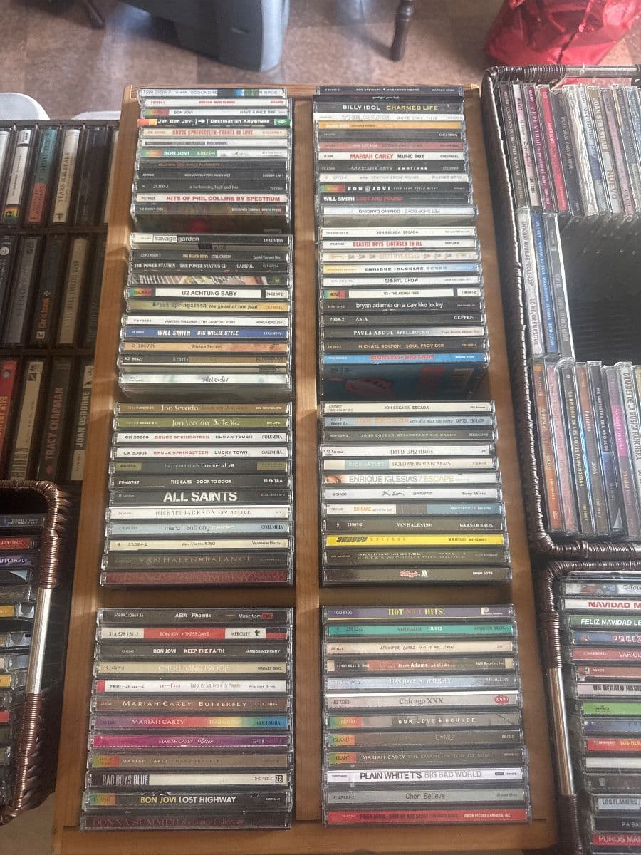 Jewelry CDs tapes, DVDs, VHS galore, lots of clothing, vintage photo 8