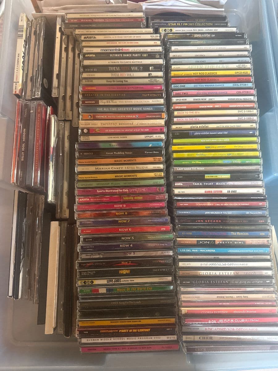 Jewelry CDs tapes, DVDs, VHS galore, lots of clothing, vintage photo 3